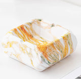 Cendrier design en marbre blanc orange
